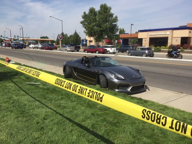 Porsche crashes into crowd at Boise auto  show injuring eight